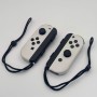 Accessori Coppia Controller OLED Ufficiali Nintendo Switch Bianchi Originali